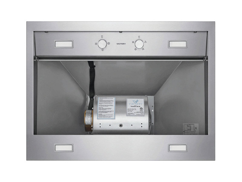 A direct underside view of the Victory Twister wall mount range hood with filters removed, revealing the all-metal 750 CFM blower motor and ETL safety labels for reliable, long-lasting kitchen performance
