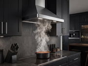 VICTORY Elegant range hood efficiently venting steam in a modern kitchen with black cabinets and LED lights on