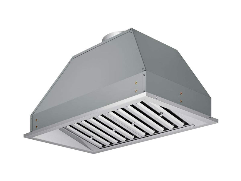 Angled view of the Victory Q2 range hood insert’s slim profile, showing stainless steel baffle filters and flush-mount flange for seamless Canadian-made built-in installation