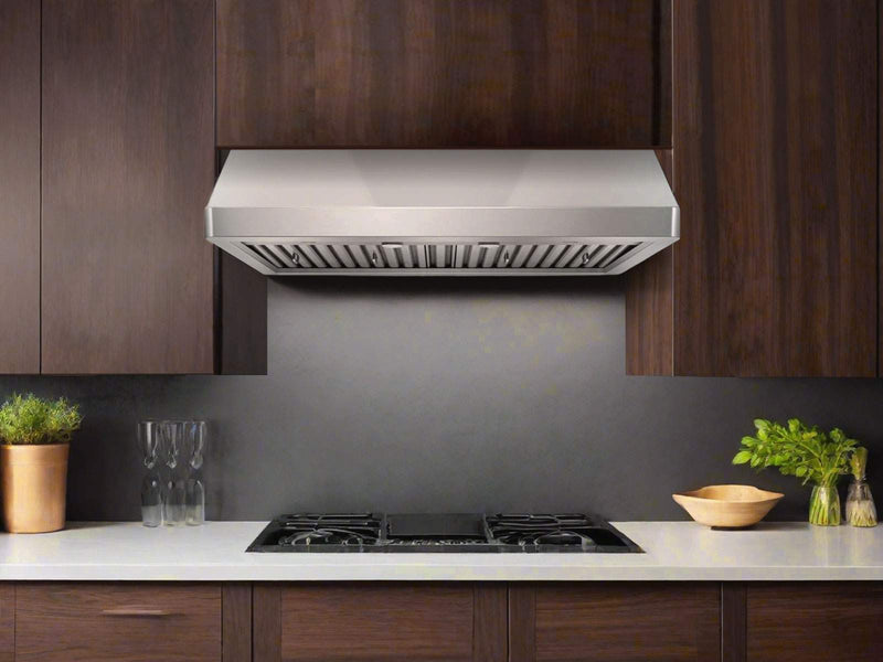 Modern kitchen installation showing the Cabinet Range Hood - VICTORY Verona mounted under dark wood cabinetry, providing high-capacity ventilation and a sleek, integrated look