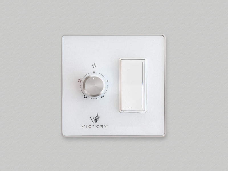 Sleek white glass Horizon wall switch for controlling fan speed and dimming lights.