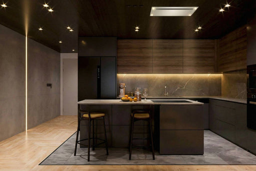 Modern kitchen featuring a white VICTORY Sunset ceiling mount range hood installed flush within a dark wood ceiling over a minimalist island bg__full