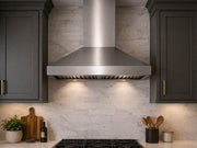 VICTORY Twister wall mount with LEDs on, installed in a modern kitchen with black cabinets and a dark backsplash