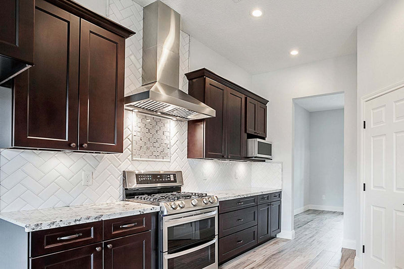 42 Inch Wall Mount Range Hood - VICTORY Twister installed in a modern kitchen with stainless steel baffle filters