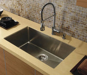 A rectangular stainless steel undermount sink basin showing the brushed metal finish and interior drainage slopes. 